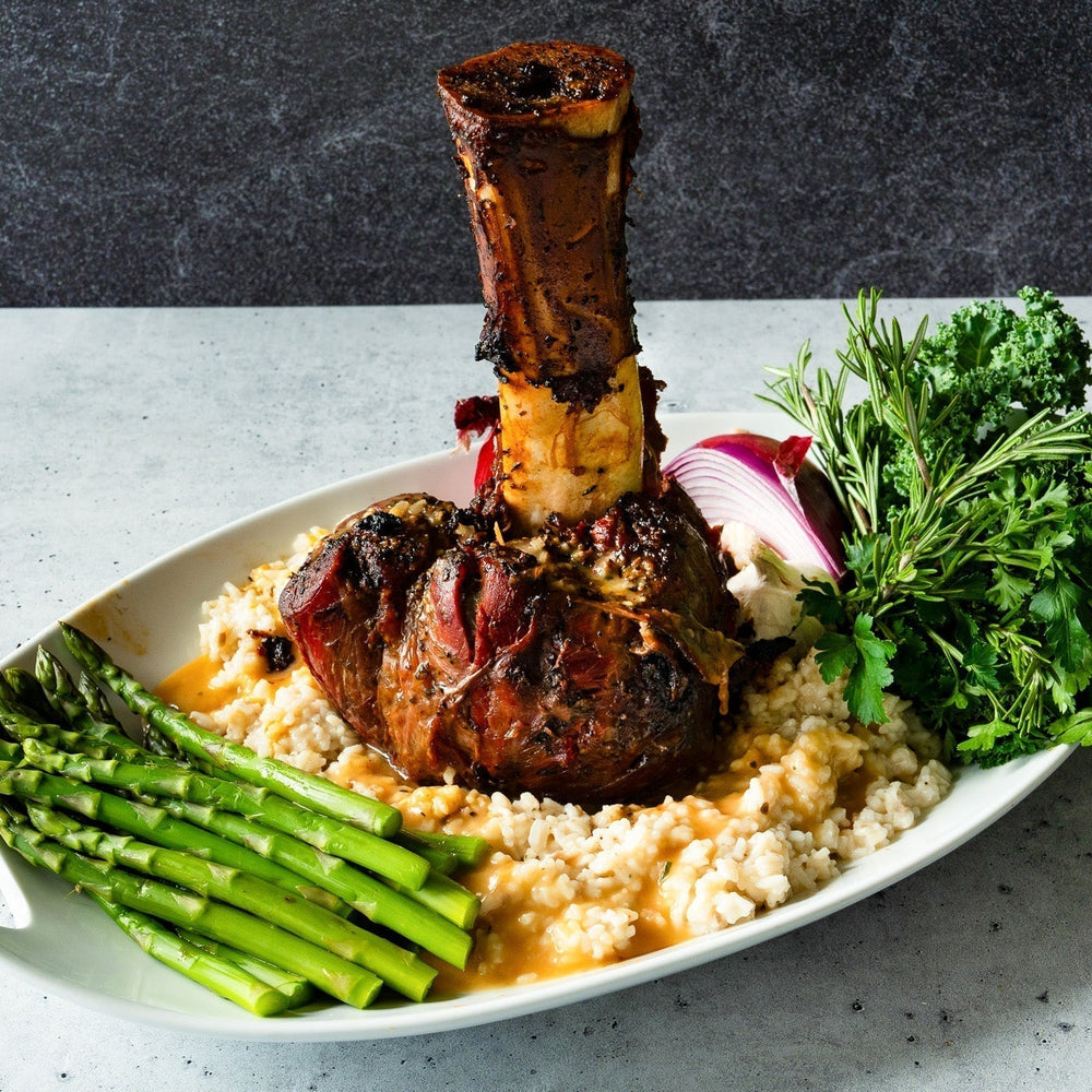 Thor's hammer plated with mushroom risotto and asparagus. 